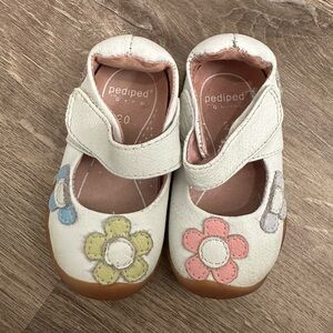 PEDIPED White Leather Mary Jane Shoes with Flower Accents